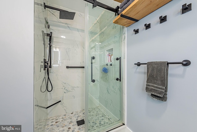 bathroom featuring a shower stall