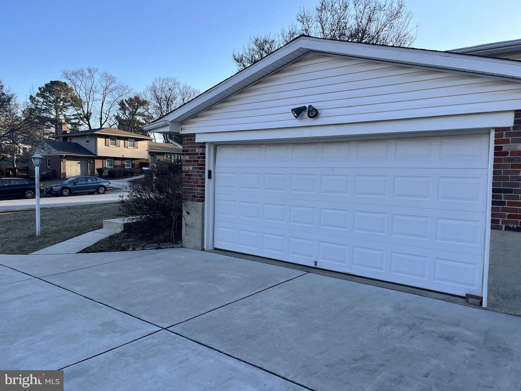 garage featuring driveway