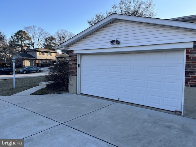 garage featuring driveway