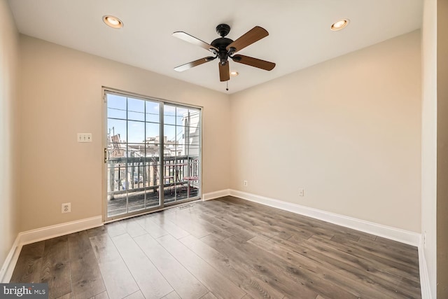 unfurnished room with ceiling fan, baseboards, dark wood finished floors, and recessed lighting