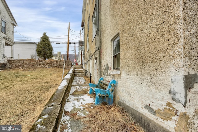 view of home's exterior with stucco siding