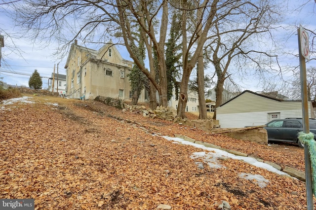 view of side of property with stucco siding