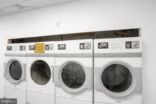 community laundry room featuring washer and clothes dryer