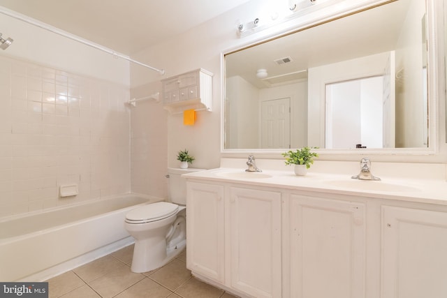 bathroom featuring visible vents, tile patterned flooring, a sink, and toilet