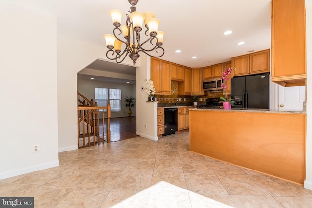 kitchen with light tile patterned floors, black appliances, recessed lighting, and baseboards