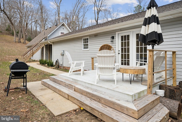 wooden terrace with grilling area and stairs