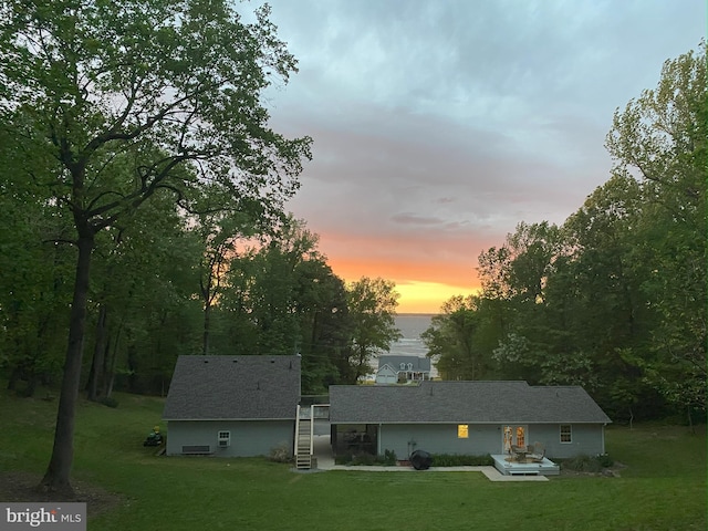 exterior space with a lawn