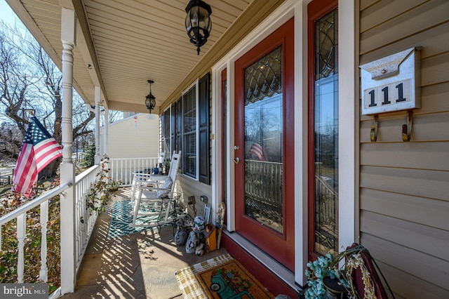 balcony featuring covered porch