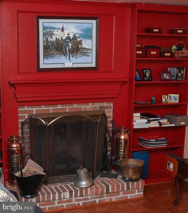 interior details with a brick fireplace