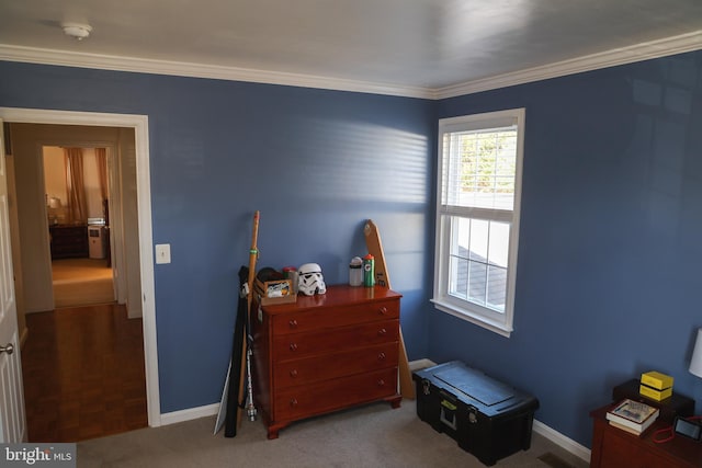 bedroom with baseboards and ornamental molding