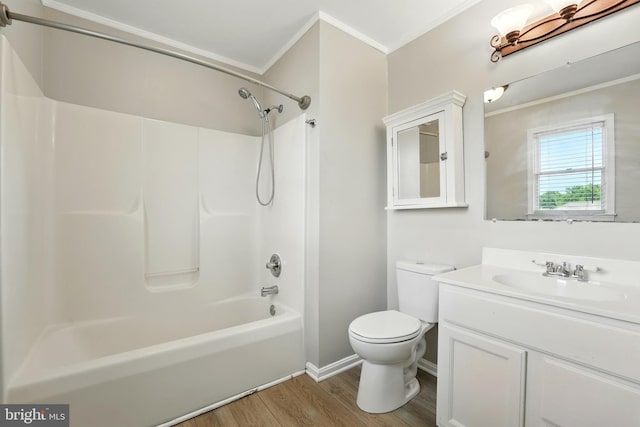 6254 Goulding Ct, Bealeton, VA 22712 - full bathroom with crown molding, toilet, wood finished floors, washtub / shower combination, and vanity