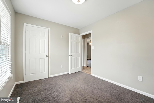 6254 Goulding Ct, Bealeton, VA 22712 - unfurnished bedroom with carpet floors and baseboards