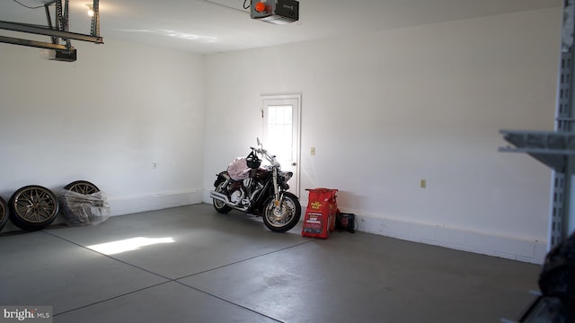 garage featuring a garage door opener