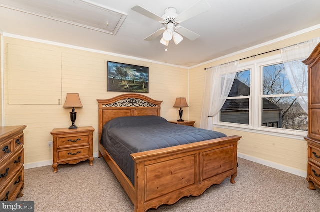 bedroom with light carpet, attic access, baseboards, and ceiling fan