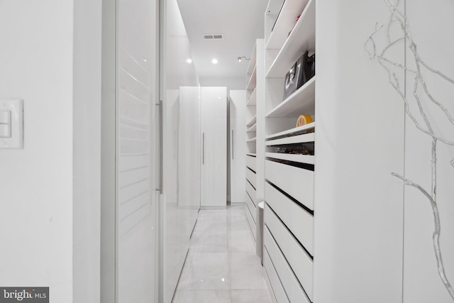 walk in closet with visible vents