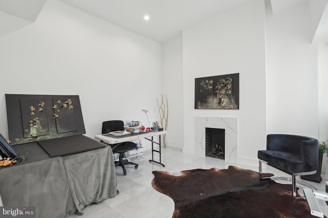 office with recessed lighting, baseboards, and a fireplace