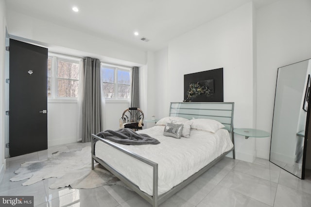 bedroom featuring recessed lighting, baseboards, and visible vents