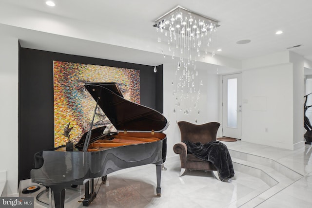 living area featuring visible vents and recessed lighting