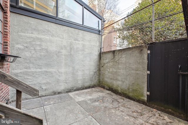 view of patio with fence