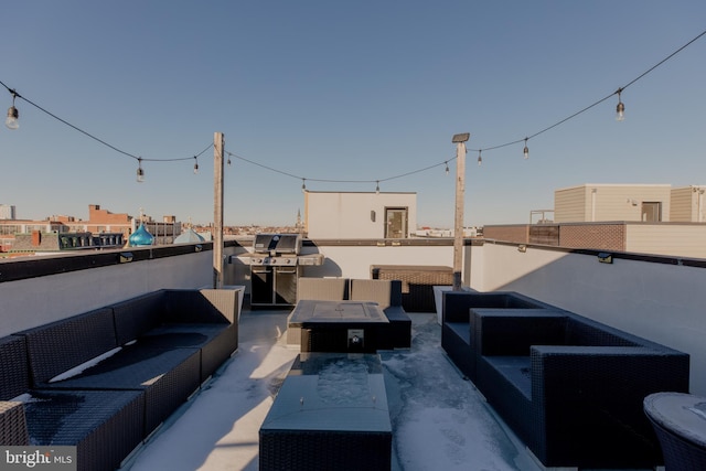 view of patio / terrace featuring an outdoor living space with a fire pit and a grill