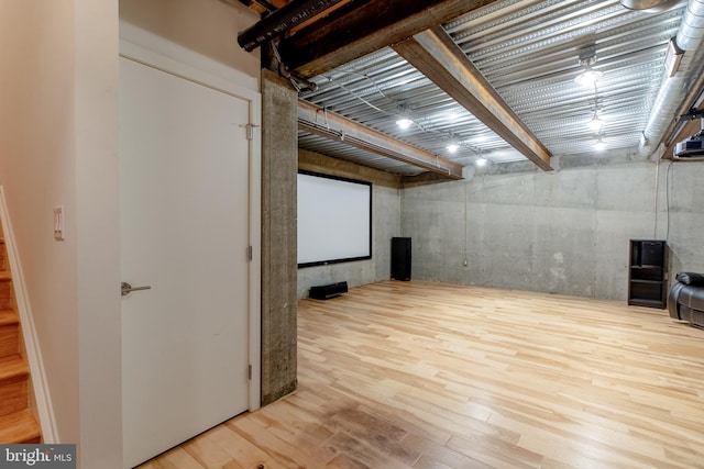 finished basement featuring light wood-type flooring