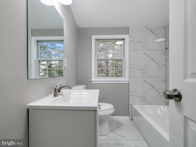 bathroom with shower / washtub combination, marble finish floor, toilet, vanity, and baseboards