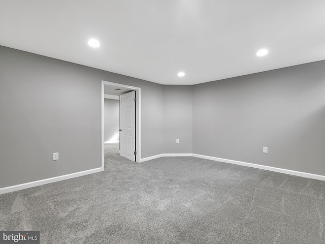 carpeted empty room with recessed lighting and baseboards