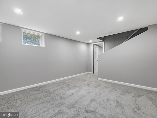 basement with recessed lighting, carpet, and baseboards