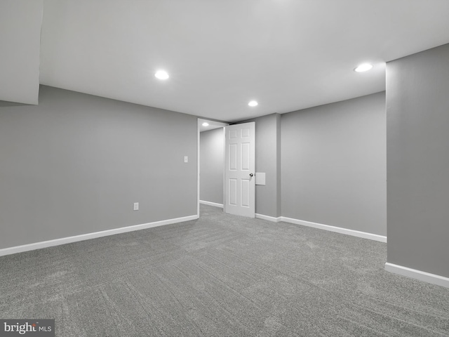 finished below grade area featuring carpet, baseboards, and recessed lighting