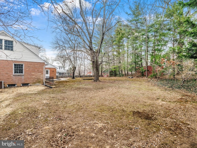 view of yard featuring central AC unit