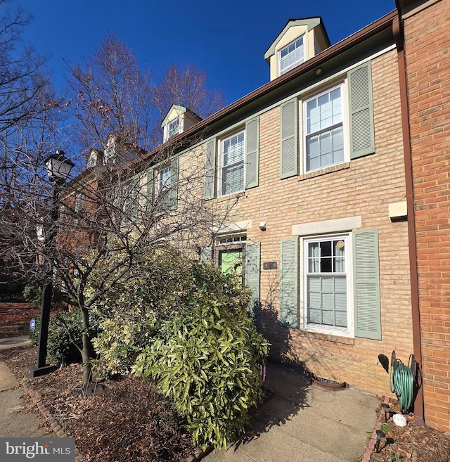 view of front of property with brick siding