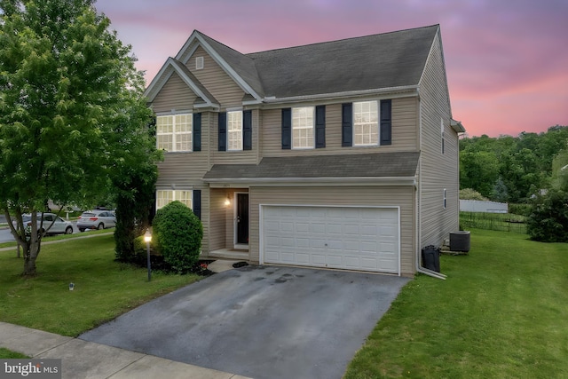 201 Adobe Dr, Middletown, PA 17057 - traditional-style house with an attached garage, driveway, and central air condition unit