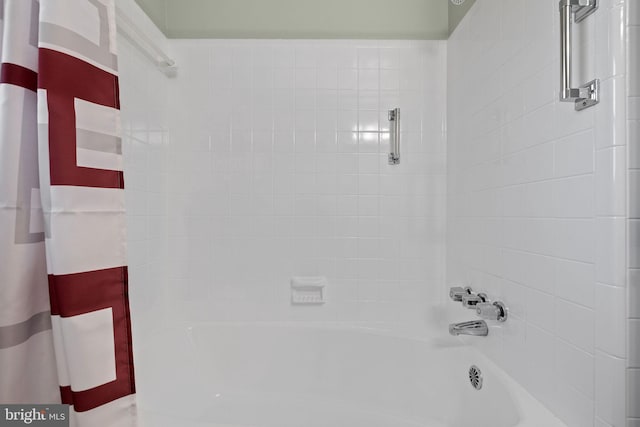 full bathroom with shower / bath combination with curtain