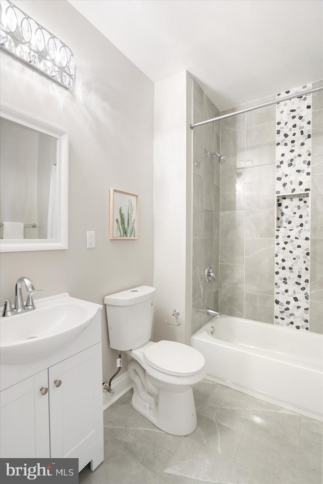 full bath with marble finish floor, vanity, toilet, and bathing tub / shower combination