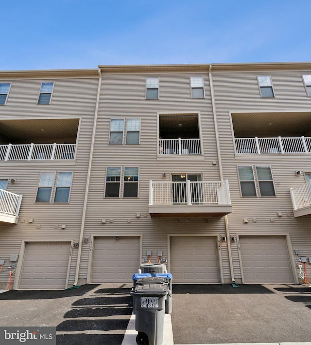 view of building exterior featuring an attached garage