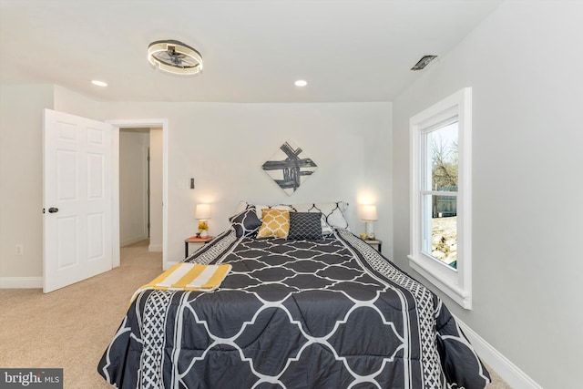 carpeted bedroom with recessed lighting and baseboards