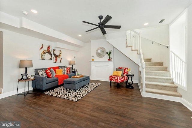 living room featuring recessed lighting, a ceiling fan, baseboards, stairway, and dark wood finished floors