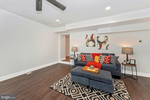 living room featuring a ceiling fan, baseboards, dark wood-style flooring, and recessed lighting