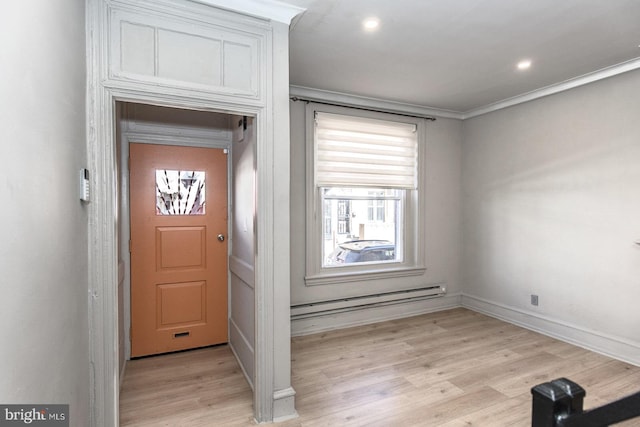 entrance foyer featuring a baseboard radiator, crown molding, light wood-style flooring, and recessed lighting