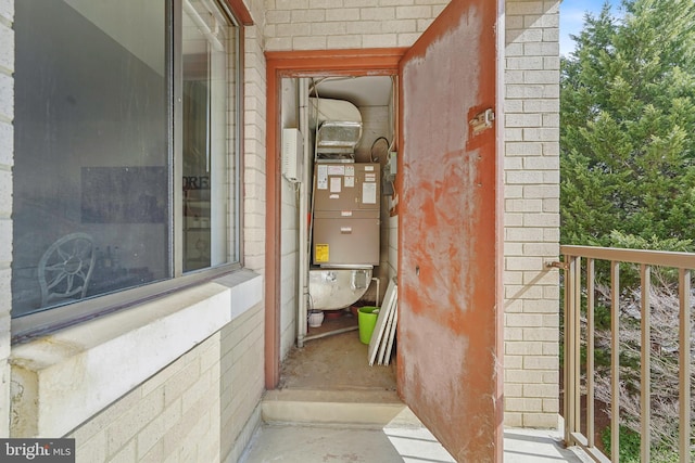 exterior space featuring brick siding