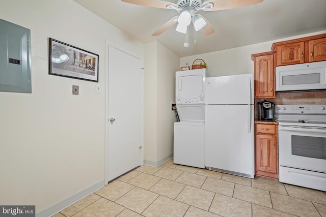 kitchen featuring white appliances, stacked washer and dryer, electric panel, decorative backsplash, and brown cabinetry