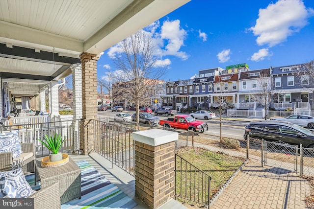 balcony featuring a residential view