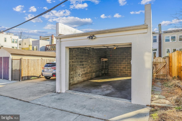 detached garage with fence