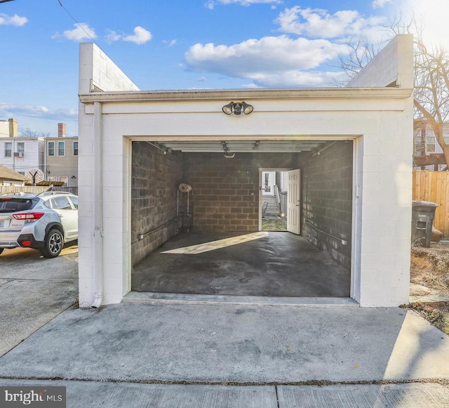 detached garage with fence