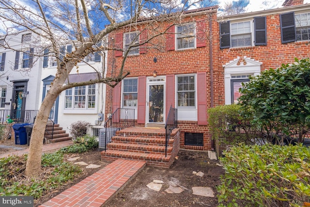 multi unit property featuring brick siding