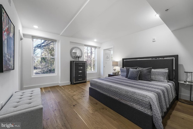 bedroom featuring recessed lighting, baseboards, and wood finished floors