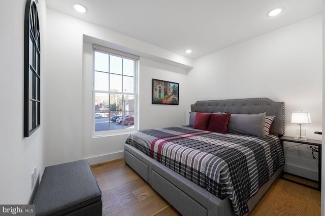 bedroom featuring recessed lighting, baseboards, and wood finished floors