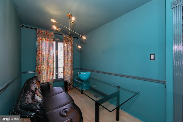 sitting room featuring wood finished floors