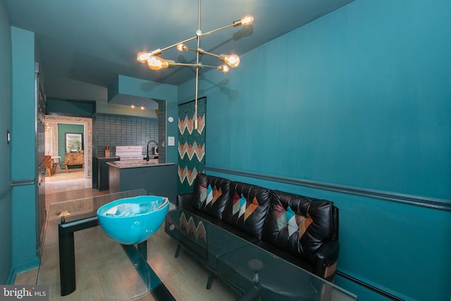 bathroom featuring a sink and baseboard heating