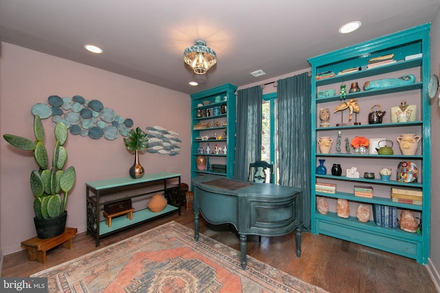 interior space featuring recessed lighting and wood finished floors